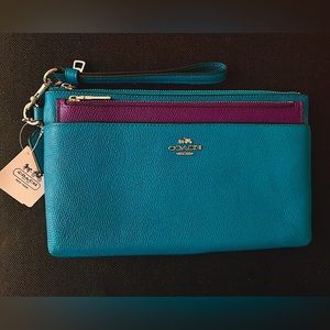COACH New With Tag 52468
Teal Large Wristlet Clutch
EMB TXT PCH W POPOUT 10”x6”